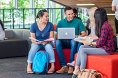 Three students in discussion